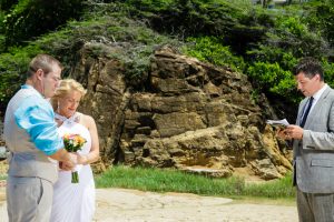 the bride groom and officiant