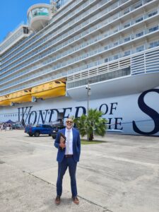 island mike wedding planner in front of royal caribbean docked at crown bay